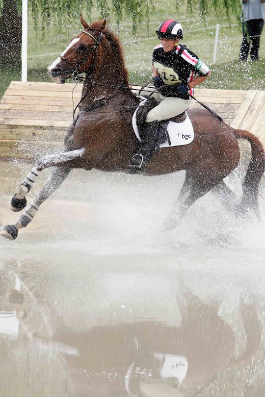 TETBURY, ENGLAND - AUGUST 5: Zara Phillips, on Ardfield Magic Star, competes in the cross country event on the second day of the Gatcombe Horse Trials at the Gatcombe Estate on August 5, 2006 in Tetbury, England. (Photo by Matt Cardy/Getty Images)