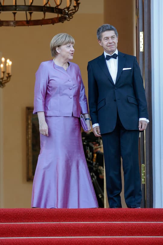 BERLIN, GERMANY - JUNE 24: Chancellor Angela Merkel and husband Joachim Sauer arrive at the Schloss Bellevue Palace during her visit to Germany on June 24, 2015 in Berlin, Germany. (Photo by Luca Teuchmann/WireImage)
