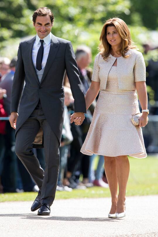 ENGLEFIELD GREEN, ENGLAND - MAY 20: Roger Federer and Mirka Federer attend the wedding of Pippa Middleton and James Matthews at St Mark's Church on May 20, 2017 in Englefield Green, England. (Photo by UK Press Pool/UK Press via Getty Images)