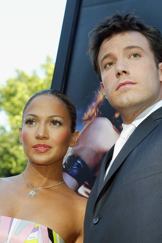 LOS ANGELES - FEBRUARY 9:  (FILE PHOTO) Actor Ben Affleck (R) and his fiance actress/singer Jennifer Lopez arrive at the premiere of "Daredevil" at the Village Theatre on February 9, 2003 in Los Angeles, California.  Lopez and Affleck postponed their wedding, which was scheduled for this weekend, and has now reportedly spit up, possibly temporarily.   (Photo by Kevin Winter/Getty Images)