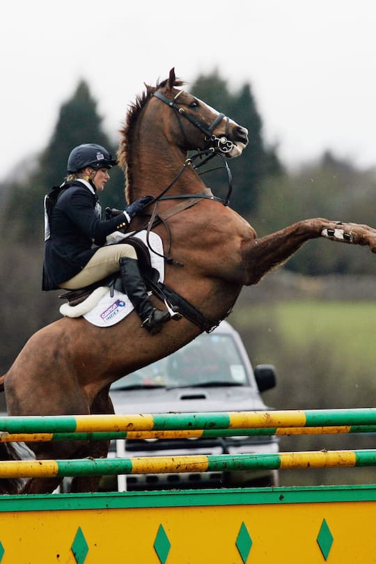 GLOUCESTERSHIRE, ENGLAND - MARCH 26: Zara Phillips controls her horse who rears up before competing in Showjumping competition at the British Eventing Gatcombe Horse Trials on March 26, 2006 at Gatcombe Park in Minchinhampton, England. (Photo by Tim Graham/ Getty Images)