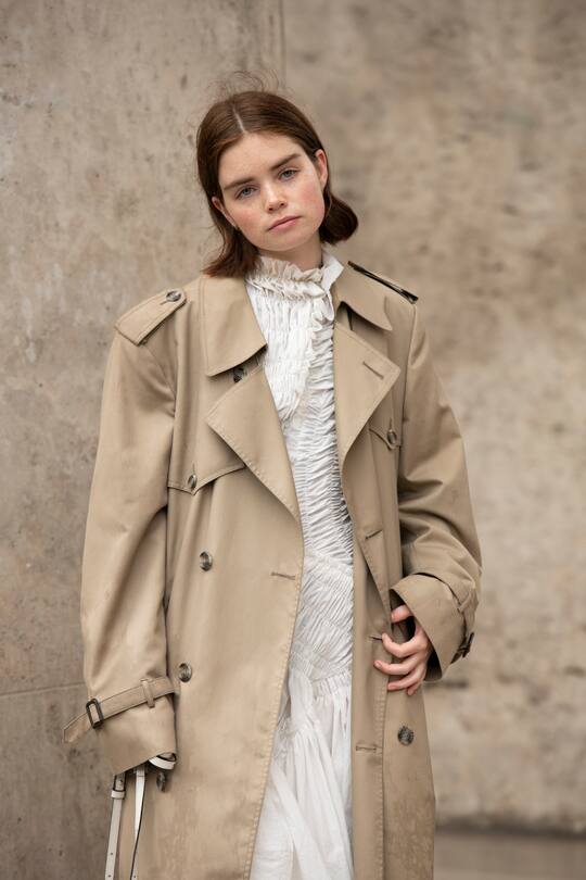 PARIS, FRANCE - SEPTEMBER 25: Digital influencer Reese Blutstein wears a Burberry trench coat and a Mugler dress on September 25, 2019 in Paris, France. (Photo by Kirstin Sinclair/Getty Images)