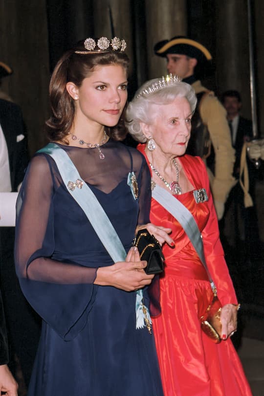 STOCKHOLM,  SWEDEN -  DECEMBER 2:     Crown Princess Victoria of Sweden, and Princess Lillian of Sweden attend a State Banquet at The Royal Palace, Stockholm, during the Russian State visit of President Boris Yeltsin, and his wife Nania, to Sweden, on December 2, 1997,  in Stockholm, Sweden. (Photo by Julian Parker/UK Press via Getty Images)