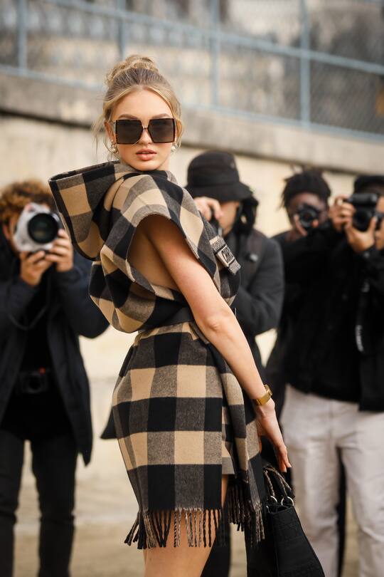 PARIS, FRANCE - FEBRUARY 25: Romee Strijd wearing Dior cape, belt, sunglasses outside the Dior show as part of the Paris Fashion Week Womenswear Fall/Winter 2020/2021 on February 25, 2020 in Paris, France. (Photo by Hanna Lassen/Getty Images)