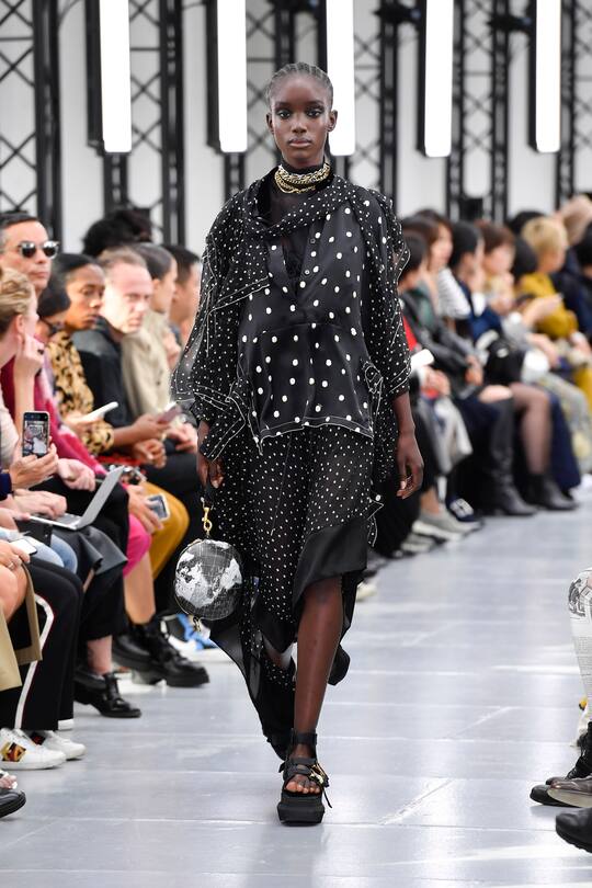PARIS, FRANCE - SEPTEMBER 30: A model walks the runway during the Sacai Ready to Wear Spring/Summer 2020 fashion show as part of Paris Fashion Week on September 30, 2019 in Paris, France. (Photo by Victor VIRGILE/Gamma-Rapho via Getty Images)