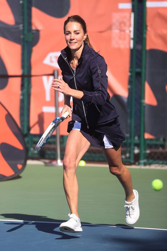 LONDON, ENGLAND - SEPTEMBER 24: Catherine, Duchess of Cambridge in action as British US Open champions Emma Raducanu, Joe Salisbury, Gordon Reid and Alfie Hewett return to the LTA's National Tennis Centre for The Homecoming and to celebrate their success on September 24, 2021 in London, England. (Photo by Chris Jackson/Getty Images for LTA)