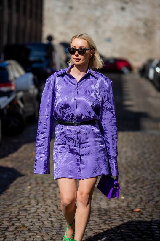 PARIS, FRANCE - SEPTEMBER 29: Justyna Czerniak wearing purple shorts, oversized button shirt outside Rochas during Paris Fashion Week - Womenswear Spring Summer 2022 on September 29, 2021 in Paris, France. (Photo by Christian Vierig/Getty Images)