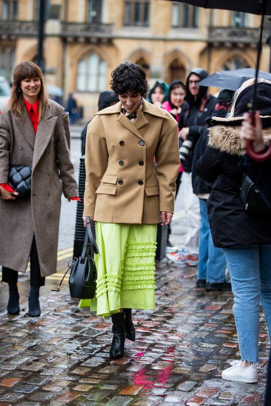 LONDON, ENGLAND - FEBRUARY 15: Yasmin Sewell is seen wearing camel jacket, neon skirt outside Molly Goddard during London Fashion Week February 2020 on February 15, 2020 in London, England. (Photo by Christian Vierig/Getty Images)