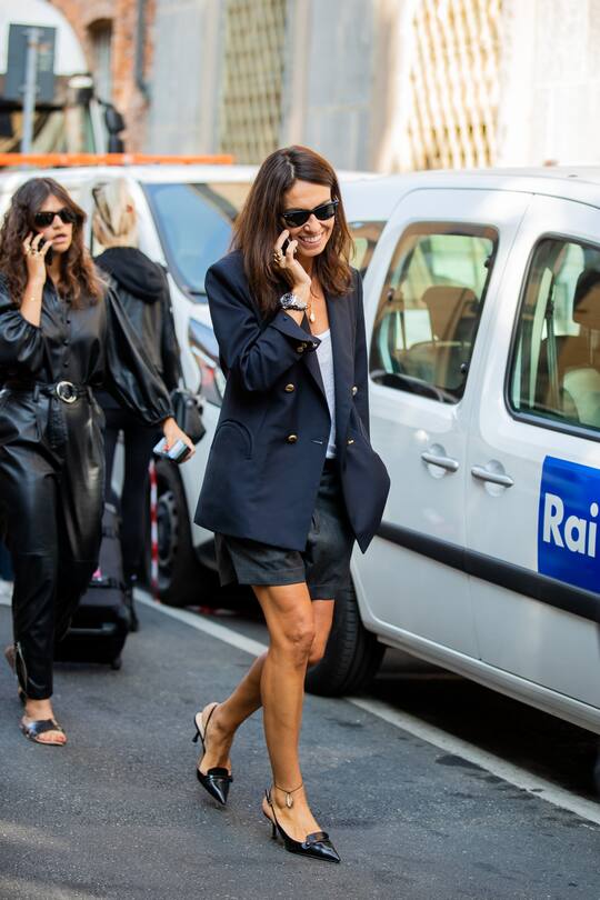 MILAN, ITALY - SEPTEMBER 20: Viviana Volpicella seen wearing navy double breasted blazer, black shorts outside the Etro show during Milan Fashion Week Spring/Summer 2020 on September 20, 2019 in Milan, Italy. (Photo by Christian Vierig/Getty Images)