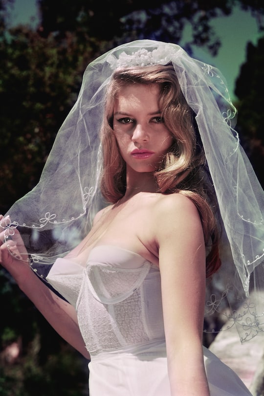 1st July 1956: French actress Brigitte Bardot, nicknamed the Sex Kitten, wearing a wedding veil. Original Publication: Picture Post - 8546 - Brigitte Bardot - unpub. (Photo by John Chillingworth/Picture Post/Hulton Archive/Getty Images)