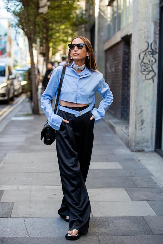 LONDON, ENGLAND - SEPTEMBER 14: Chloé Harrouche is seen wearing ripped blue button shirt, black pants outside Marques Almeida during London Fashion Week September 2019 on September 14, 2019 in London, England. (Photo by Christian Vierig/Getty Images)