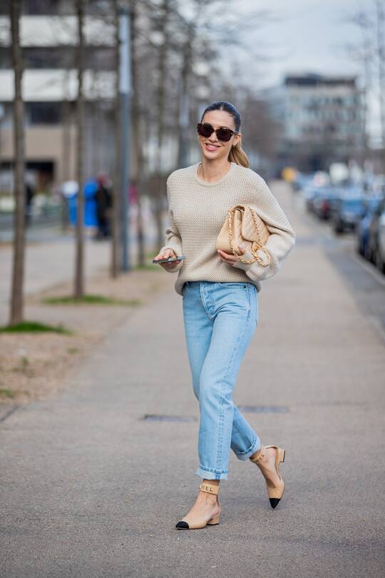 DUSSELDORF, GERMANY - FEBRUARY 06: Ann-Kathrin Götze is seen wearing beige Ferragamo jumper, denim jeans Saint Laurent, Chanel bag and shoes in beige, sunglasses Dior on February 06, 2021 in Dusseldorf, Germany. (Photo by Christian Vierig/Getty Images)