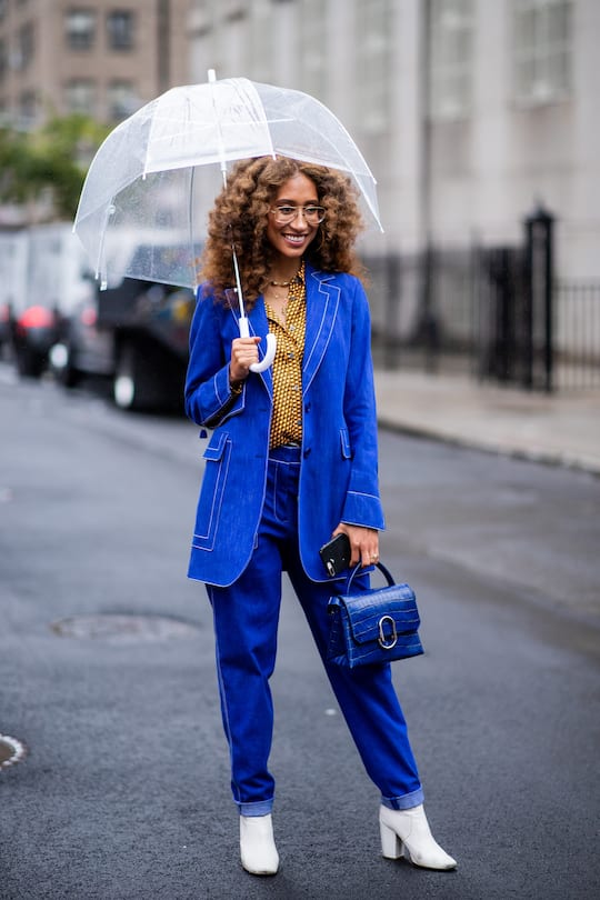 NEW YORK, NY - SEPTEMBER 10: A guest wearing denim blzaer and pants, white ankle boots is seen outside 3.1 Phillip Lim during New York Fashion Week Spring/Summer 2019 on September 10, 2018 in New York City. (Photo by Christian Vierig/Getty Images)