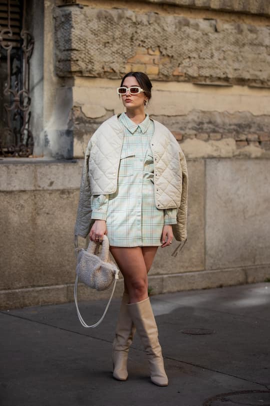 BUDAPEST, HUNGARY - MARCH 23: Gina Pásztor is seen wearing Co-ord (top and skirt): Reserved, Boots: LeGer, Bag: LegerSunglasses: Meller on March 23, 2022 in Budapest, Hungary. (Photo by Christian Vierig/Getty Images)