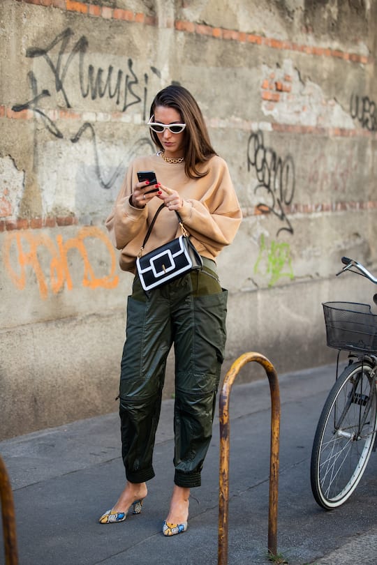 MILAN, ITALY - SEPTEMBER 21: Diletta Bonaiuti wearing beige jumper, khaki pants outside the Ferragamo show during Milan Fashion Week Spring/Summer 2020 on September 21, 2019 in Milan, Italy. (Photo by Christian Vierig/Getty Images)