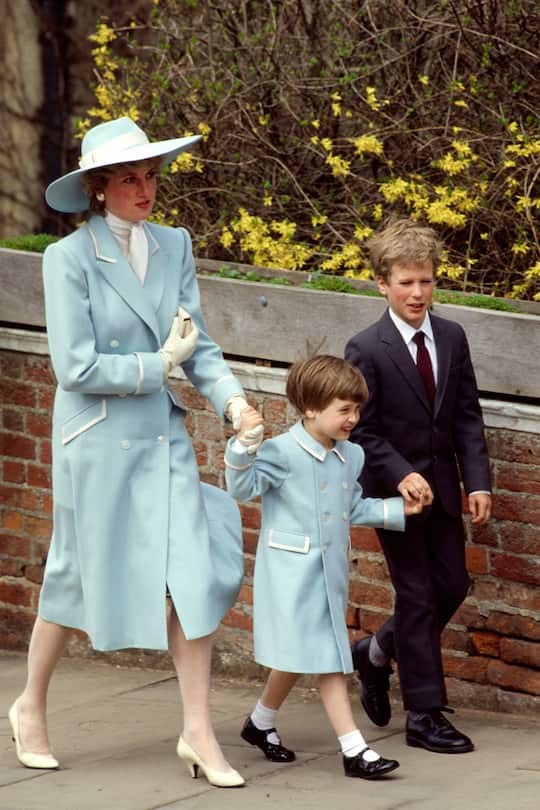 WINDSOR, UNITED KINGDOM - APRIL 19: Diana, Princess Of Wales, With Her Son, Prince William And Her Nephew, Peter Phillips, On Their Way To Easter Service. The Princess Is Wearing A Pale Blue Coat Designed By Catherine Walker Who Made A Similar One For Prince William (Photo by Tim Graham Photo Library via Getty Images)