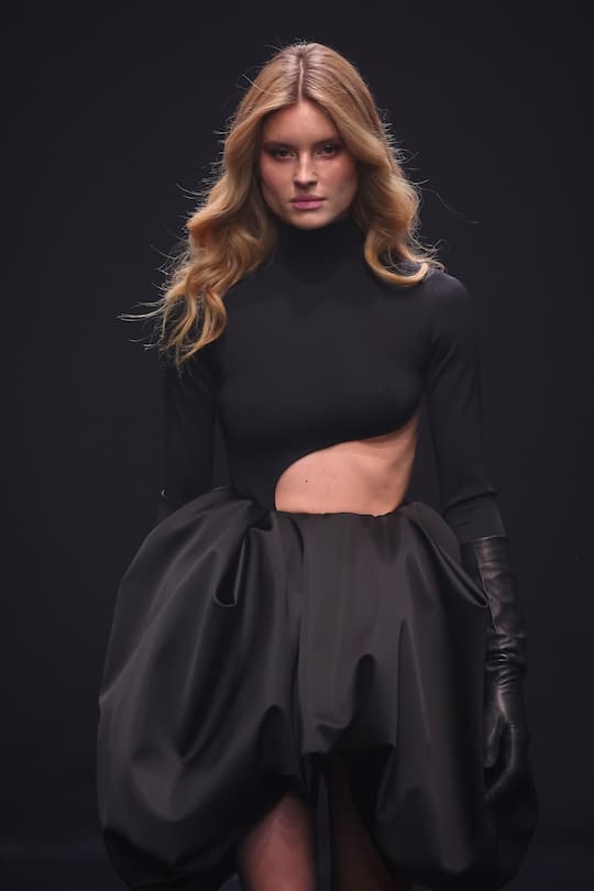 BERLIN, GERMANY - JANUARY 31: A model walks the runway at the COLLECTIVEFOUR Kilian Kerner fashion show during Berlin Fashion Week Autumn/Winter 2025 at Uber Eats Music Hall on January 31, 2025 in Berlin, Germany. (Photo by Sebastian Reuter/Getty Images for Kilian Kerner)