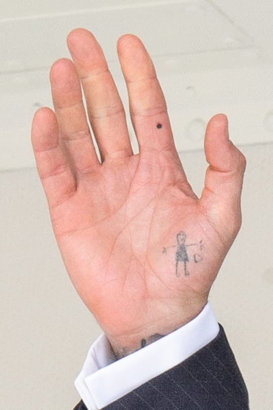 MIAMI, FL - JULY 12: David Beckham speaks on stage to the fans prior to appearing before the Miami City Commission at Miami City Hall on July 12, 2018 in Miami, Florida.