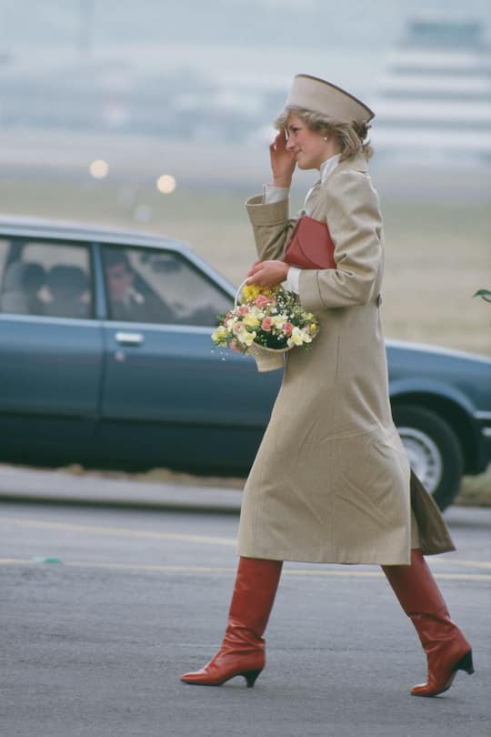 Diana, Princess of Wales (1961 - 1997) wearing a beige Caroline Charles coat during a visit to Derby, UK, February 1985. (Photo by Jayne Fincher/Princess Diana Archive/Getty Images)