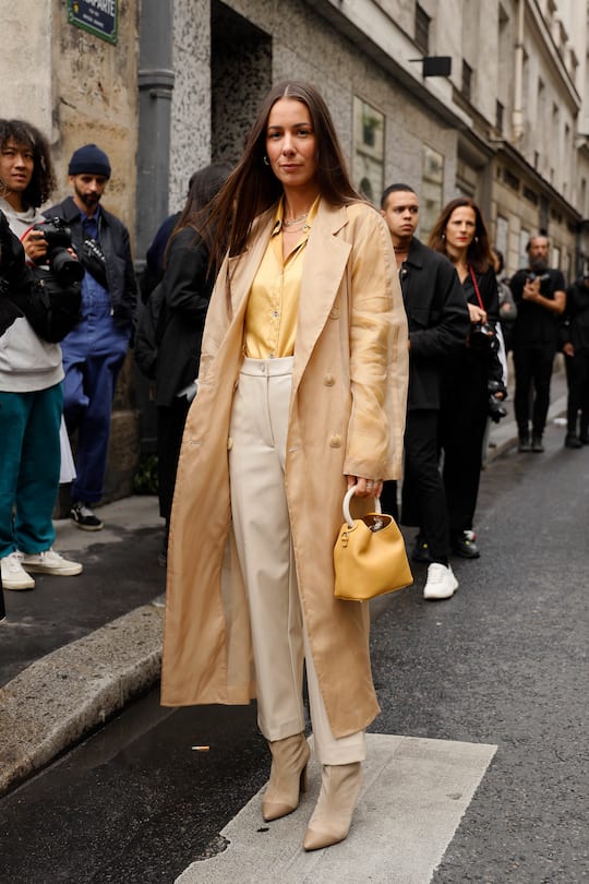 PARIS, FRANCE - SEPTEMBER 29: A guest wearing trench outside Thom Browne during Paris Fashion Week Womenswear Spring Summer 2020 on September 29, 2019 in Paris, France. (Photo by Hanna Lassen/Getty Images)