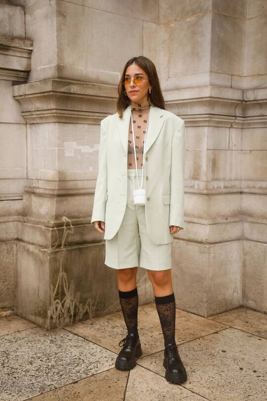 PARIS, FRANCE - MARCH 02: A guest wearing pale mint suit and Jacquemus mini bag outside Stella McCartney during Paris Fashion Week Womenswear Fall/Winter 2020/2021 Day Eight on March 02, 2020 in Paris, France. (Photo by Hanna Lassen/Getty Images)