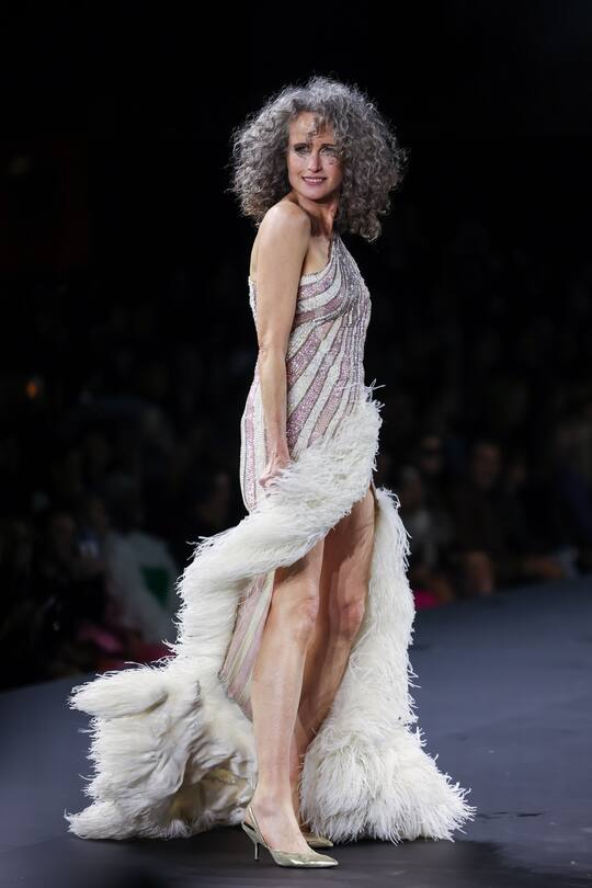 PARIS, FRANCE - OCTOBER 02: (EDITORIAL USE ONLY - For Non-Editorial use please seek approval from Fashion House) Andie MacDowell walks the runway during the "Le Defile Walk Your Worth" By L'Oreal Womenswear Spring/Summer 2023 show as part of Paris Fashion Week on October 02, 2022 in Paris, France. (Photo by Arnold Jerocki/Getty Images)