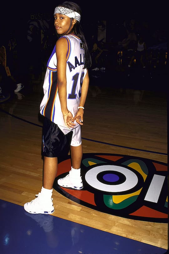 Singer/actress Aaliyah wearing basketball uniform at MTV's Rock N Jock benefit. (Photo by Mirek Towski/DMI/The LIFE Picture Collection via Getty Images)