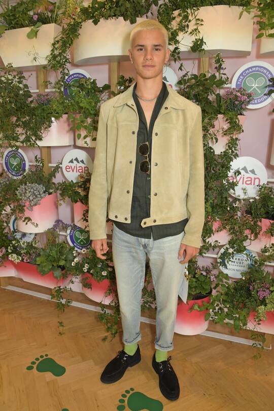 LONDON, ENGLAND - JUNE 28: Romeo Beckham poses in evian's VIP suite, certified as carbon neutral by The Carbon Trust, during day one of The Championships, Wimbledon 2021 on June 28, 2021 in London, England. (Photo by David M. Benett/Dave Benett/Getty Images for evian)