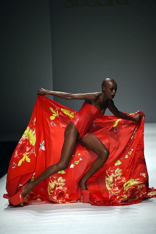 BEIJING, CHINA - MARCH 30: (CHINA OUT) A model falls over on the runway at SECCRY Hu Sheguang Collection 2014 Show during Mercedes-Benz China Fashion Week Autumn/Winter 2014/2015 at the 751D-PARK Central Hall on March 30, 2014 in Beijing, China. (Photo by Visual China Group via Getty Images/Visual China Group via Getty Images)
