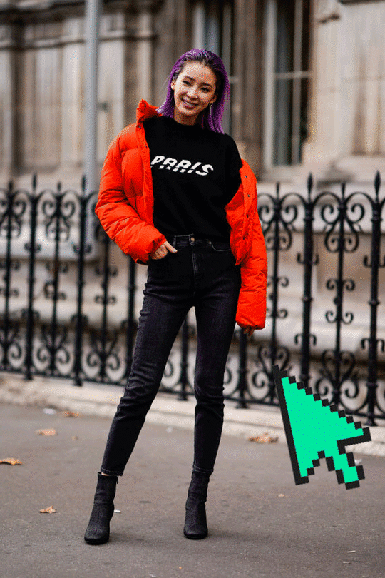 Irene Kim trägt ihre Daunenjacke offen