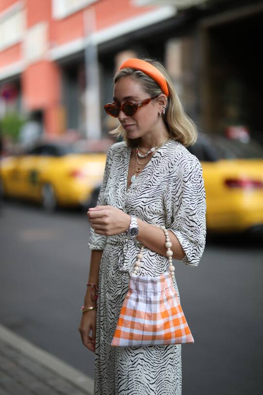 COPENHAGEN, DENMARK - AUGUST 06: Sonia Lyson wearing Edited dress, Ducie hairband, Wald Berlin shoes, jewelry and bag on August 06, 2019 in Copenhagen, Denmark. (Photo by Jeremy Moeller/Getty Images)