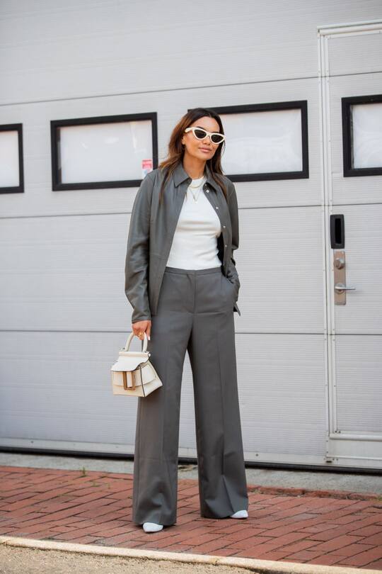 COPENHAGEN, DENMARK - AUGUST 08: Funda Christophersen is seen wearing grey pants outside By Malene Birger during Copenhagen Fashion Week Spring/Summer 2020 on August 08, 2019 in Copenhagen, Denmark. (Photo by Christian Vierig/Getty Images)