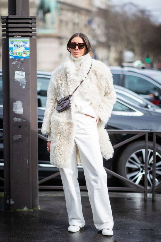 PARIS, FRANCE - MARCH 05: Julie Pelipas is seen wearing white turtleneck, white teddy jacket, brown mini Celine bag outside Miu Miu during Paris Fashion Week Womenswear Fall/Winter 2019/2020 on March 05, 2019 in Paris, France. (Photo by Christian Vierig/Getty Images)