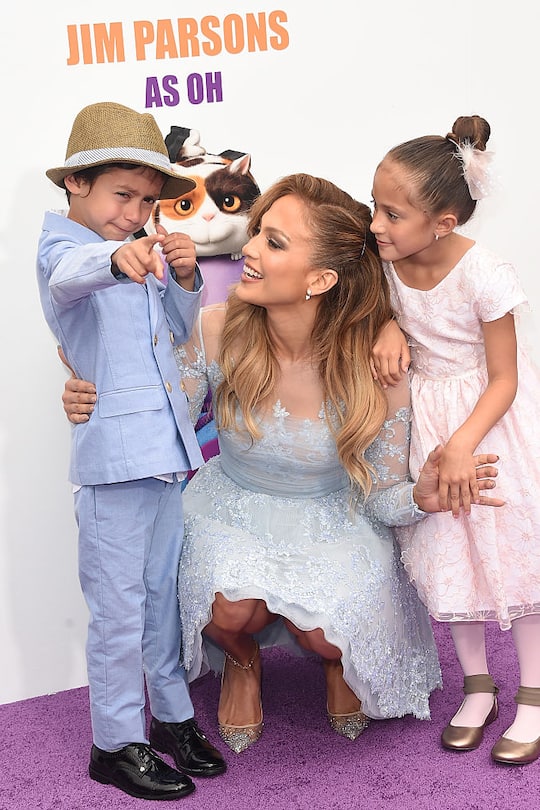 WESTWOOD, CA - MARCH 22: Recording Artist/actress Jennifer Lopez (C) and son Maximilian David Muniz (L) and daughter Emme Maribel Muniz (R) arrive at Twentieth Century Fox And Dreamworks Animation's 'Home' Premiere at Regency Village Theatre on March 22, 2015 in Westwood, California. (Photo by Jason Merritt/Getty Images)