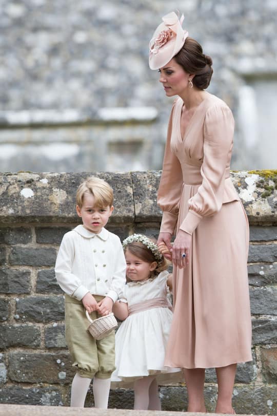 ENGLEFIELD GREEN, ENGLAND - MAY 20: Catherine, Duchess of Cambridge, Princess Charlotte of Cambridge and Prince George of Cambridge attend the wedding Of Pippa Middleton and James Matthews at St Mark's Church on May 20, 2017 in Englefield Green, England. (Photo by Pool/Samir Hussein/WireImage)