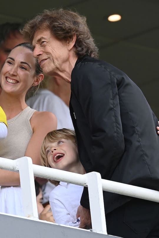 LONDON, ENGLAND - JULY 28: Sir Mick Jagger of The Rolling Stones poses for a photo with his partner Melanie Hamrick and their son Deveraux during the second day of the 5th Test between England and Australia at The Kia Oval on July 28, 2023 in London, England. (Photo by Philip Brown/Popperfoto/Popperfoto via Getty Images)