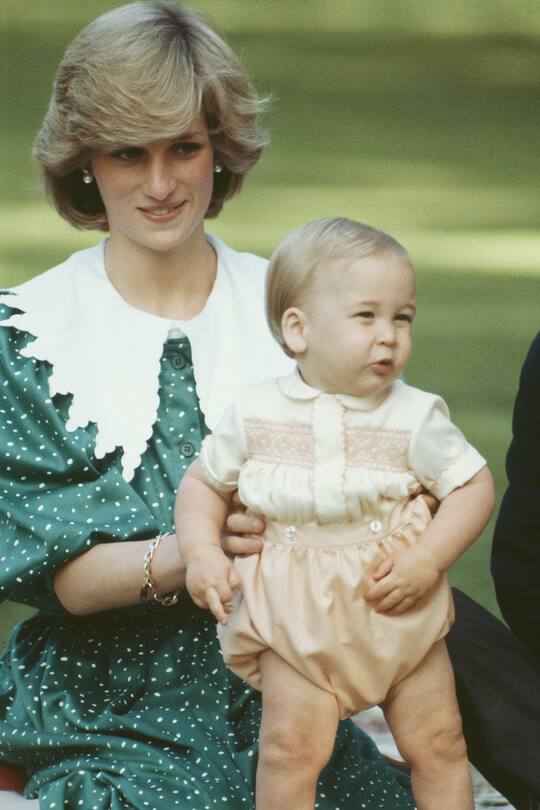 Diana, Princess of Wales (1961 - 1997) with her 10-month-old son Prince William on the lawn of Government House in Auckland, New Zealand, 23rd April 1983. (Photo by Jayne Fincher/Princess Diana Archive/Getty Images)