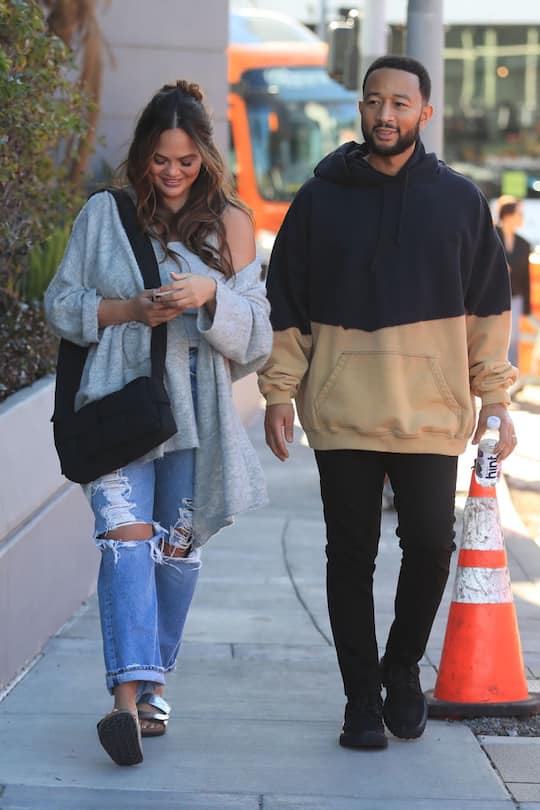 LOS ANGELES, CA - FEBRUARY 08: Chrissy Teigen and John Legend are seen on February 8, 2023 in Los Angeles, California. (Photo by Hollywood To You/Star Max/GC Images)