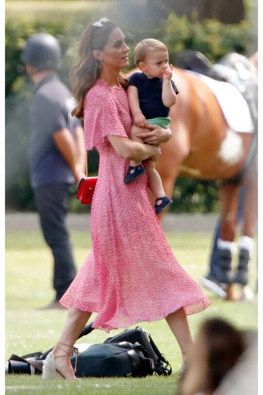 WOKINGHAM, UNITED KINGDOM - JULY 10: (EMBARGOED FOR PUBLICATION IN UK NEWSPAPERS UNTIL 24 HOURS AFTER CREATE DATE AND TIME) Catherine, Duchess of Cambridge and Prince Louis of Cambridge attend the King Power Royal Charity Polo Match, in which Prince William, Duke of Cambridge and Prince Harry, Duke of Sussex were competing for the Khun Vichai Srivaddhanaprabha Memorial Polo Trophy at Billingbear Polo Club on July 10, 2019 in Wokingham, England. (Photo by Max Mumby/Indigo/Getty Images)