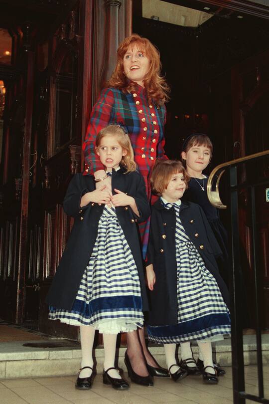 The Duchess of York, Sarah Ferguson, - founder of the charity Children in Crisis - with her daughters Princess Beatrice (left) and Eugenie (centre), as they arrive at Richmond Theatre for a gala performance of the pantomime "Peter Pan". (Photo by Martin Keene - PA Images/PA Images via Getty Images)