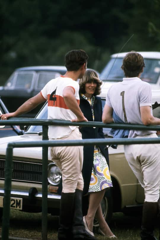Prince Charles chats to Camilla Parker-Bowles at a polo match. (Photo by © Hulton-Deutsch Collection/CORBIS/Corbis via Getty Images)
