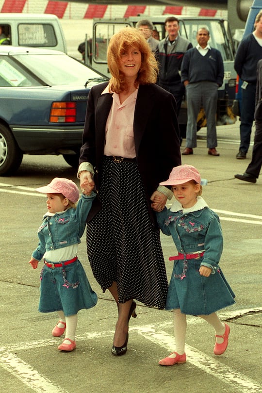 The Duchess of York arrives at Heathrow airport with her daughters, princesses Eugenie and Beatrice before leaving for a holiday in Klosters. (Photo by Tim Ockenden - PA Images/PA Images via Getty Images)
