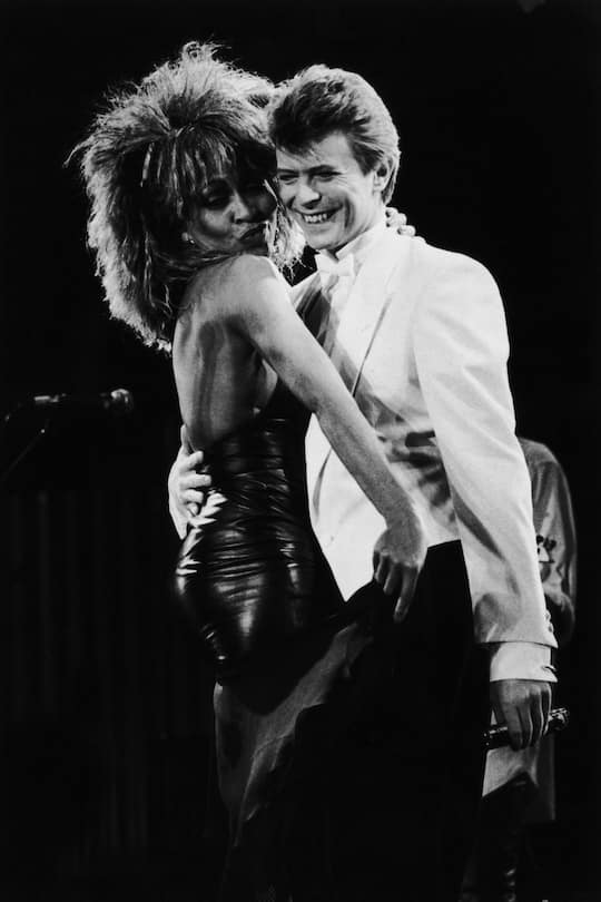 FILE - MAY 24: Legendary singer Tina Turner has died at 83. BIRMINGHAM - 1985: Singers David Bowie and Tina Turner perform on stage at the NEC Birmingham. (Photo by Dave Hogan/Getty Images)