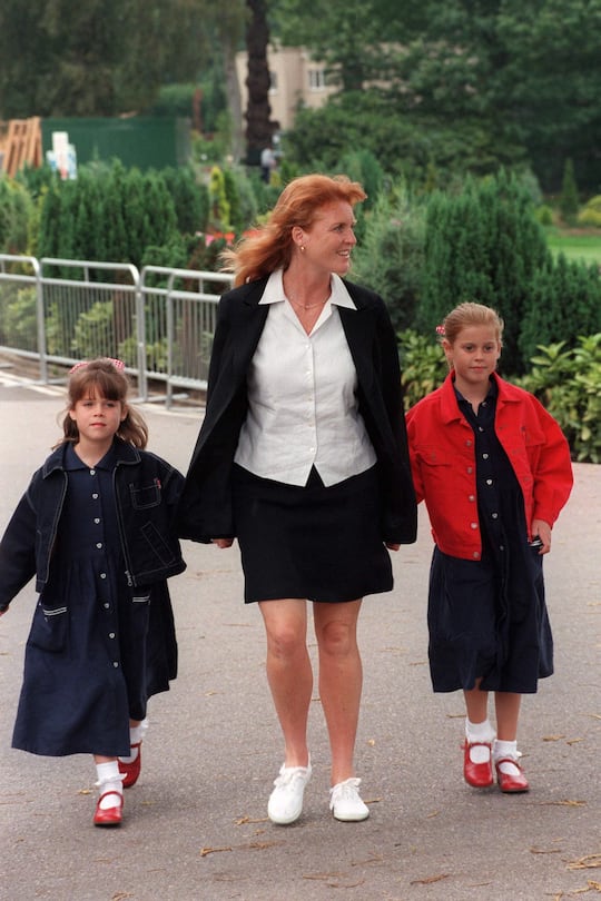 WENTWORTH, UNITED KINGDOM - AUGUST 04: Sarah, Duchess Of York, With Princess Eugenie & Princess Beatrice At Wentworth Golf Club (Photo by Tim Graham Photo Library via Getty Images)