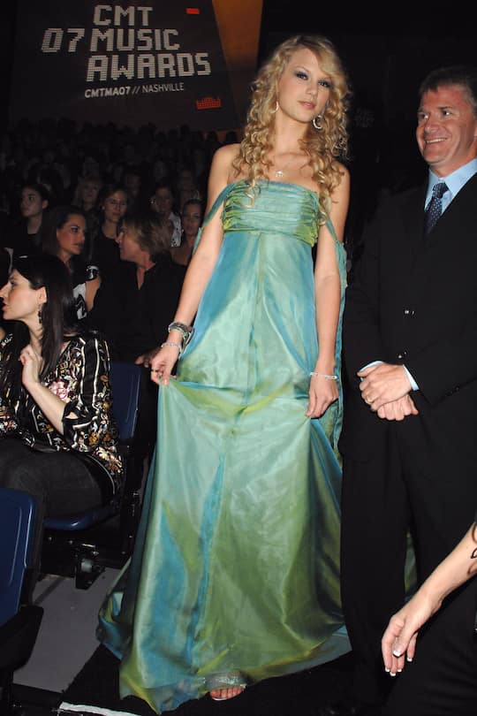 Taylor Swift and Jeff Burton during 2007 CMT Music Awards - Backstage and Audience at The Curb Event Center at Belmont University in Nashville, Tennessee, United States. ***Exclusive*** (Photo by Jeff Kravitz/FilmMagic, Inc)