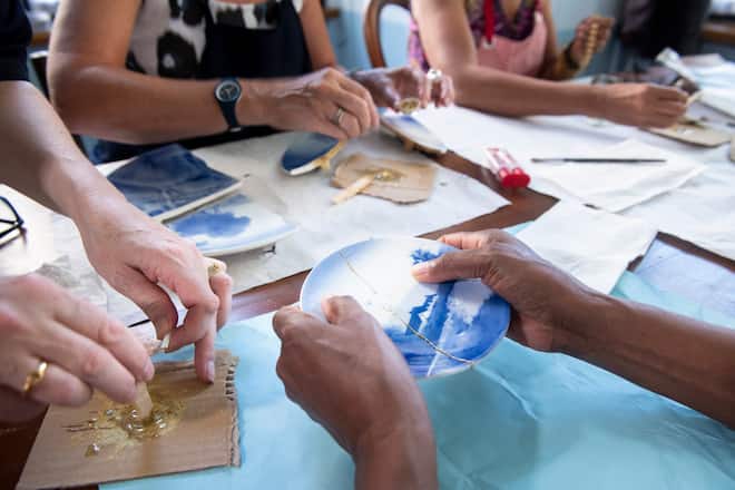 New kintsugi is a modern repair technique based on an old Japanese one.Kintsugi is the Japanese art of repairing broken pottery with glue and powdered gold, silver or platinum. The idea is that breakage and repair are part of the object's history instead of something to hide. It actually adds value to the object.