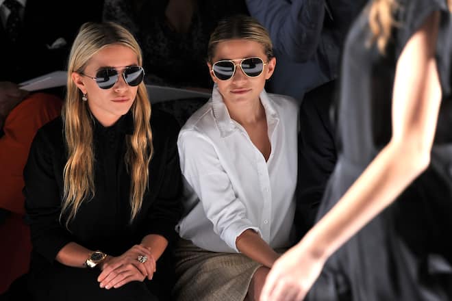NEW YORK, NY - SEPTEMBER 14: (L-R) Mary-Kate Olsen and Ashley Olsen attend the J.Mendel Spring 2012 Fashion Show at Lincoln Center on September 14, 2011 in New York City. (Photo by Stephen Lovekin/Getty Images for J.Mendel)