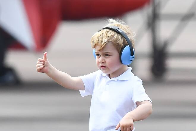 FAIRFORD, ENGLAND - JULY 08: Prince George of Cambridge gives a thumbs up as he attends the The Royal International Air Tattoo at RAF Fairford on July 8, 2016 in Fairford, England. (Photo by Samir Hussein/WireImage)