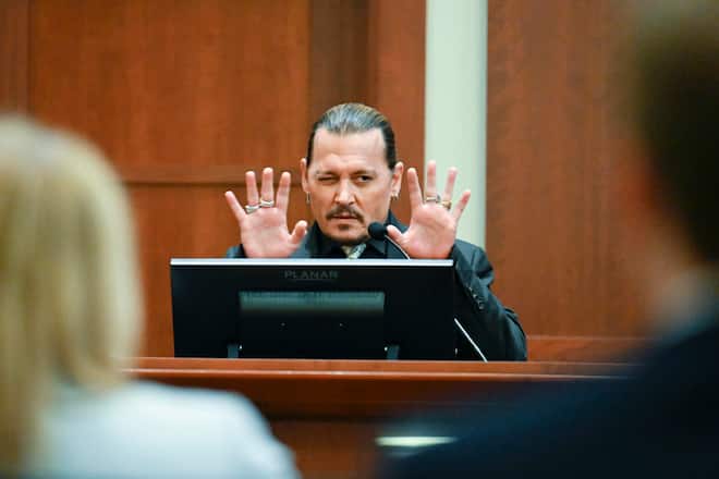Actor Johnny Depp testifies during a hearing at the Fairfax County Circuit Court in Fairfax, Va., Tuesday April 19, 2022. Actor Johnny Depp sued his ex-wife Heard for libel in Fairfax County Circuit Court after she wrote an op-ed piece in The Washington Post in 2018 referring to herself as a "public figure representing domestic abuse." (Jim Watson/Pool Photo via AP)