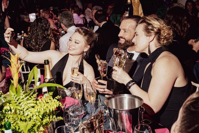 LONDON, ENGLAND - MAY 14: (L-R) Mia Threapleton, Edward Abel Smith and Kate Winslet attend the 2023 BAFTA Television Awards with P&O Cruises Dinner at The Royal Festival Hall on May 14, 2023 in London, England. (Photo by Rowben Lantion/BAFTA via Getty Images)